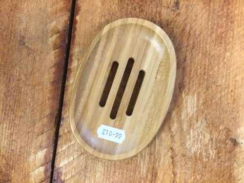 Oval bamboo soap dish, eco-friendly, sustainable, natural bamboo, optimal drainage design.