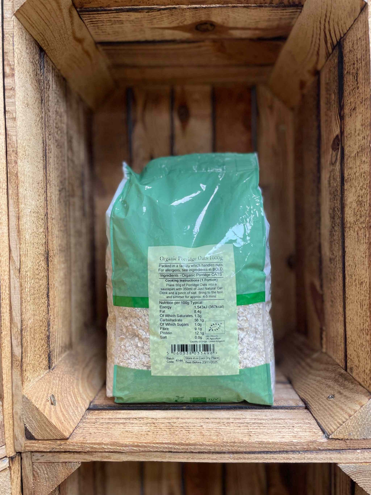 Organic Porridge Oats 1kg in eco-friendly packaging in a wooden box.