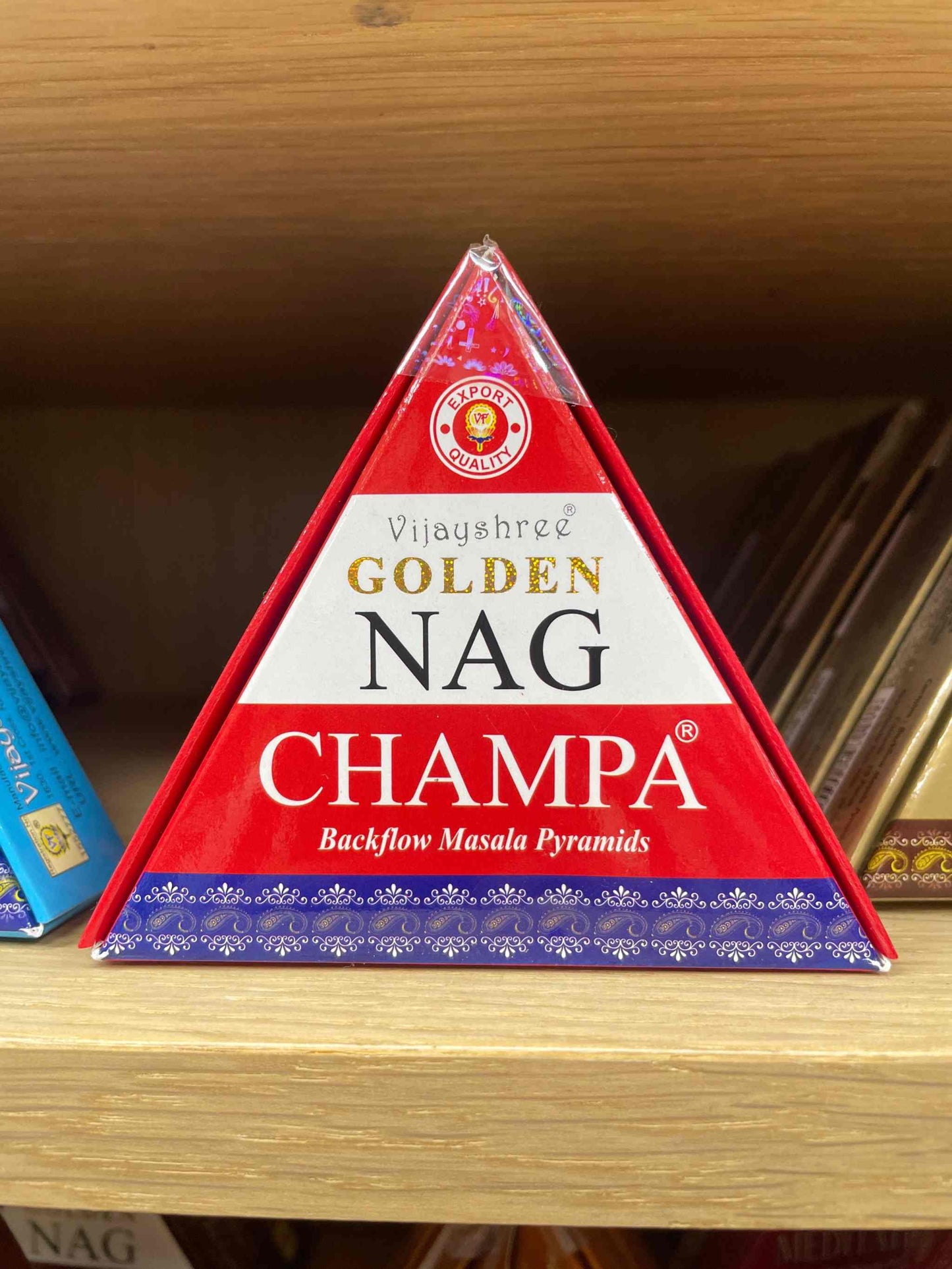 NagChampa BackFlow Cones packaging on shelf displaying aromatic incense features.
