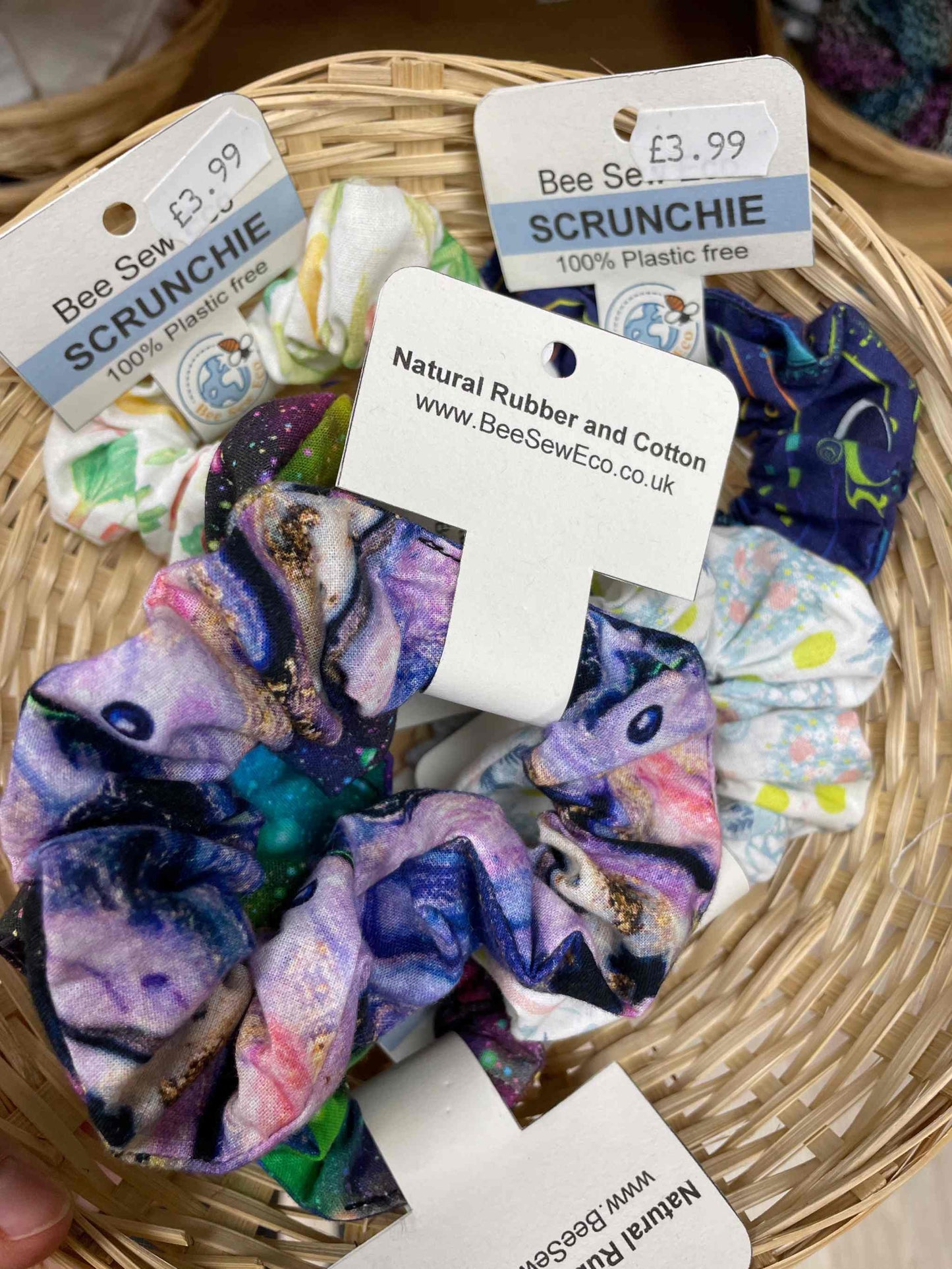 Eco Coach House medium scrunchies in various colors, eco-friendly and sustainable hair accessory.
