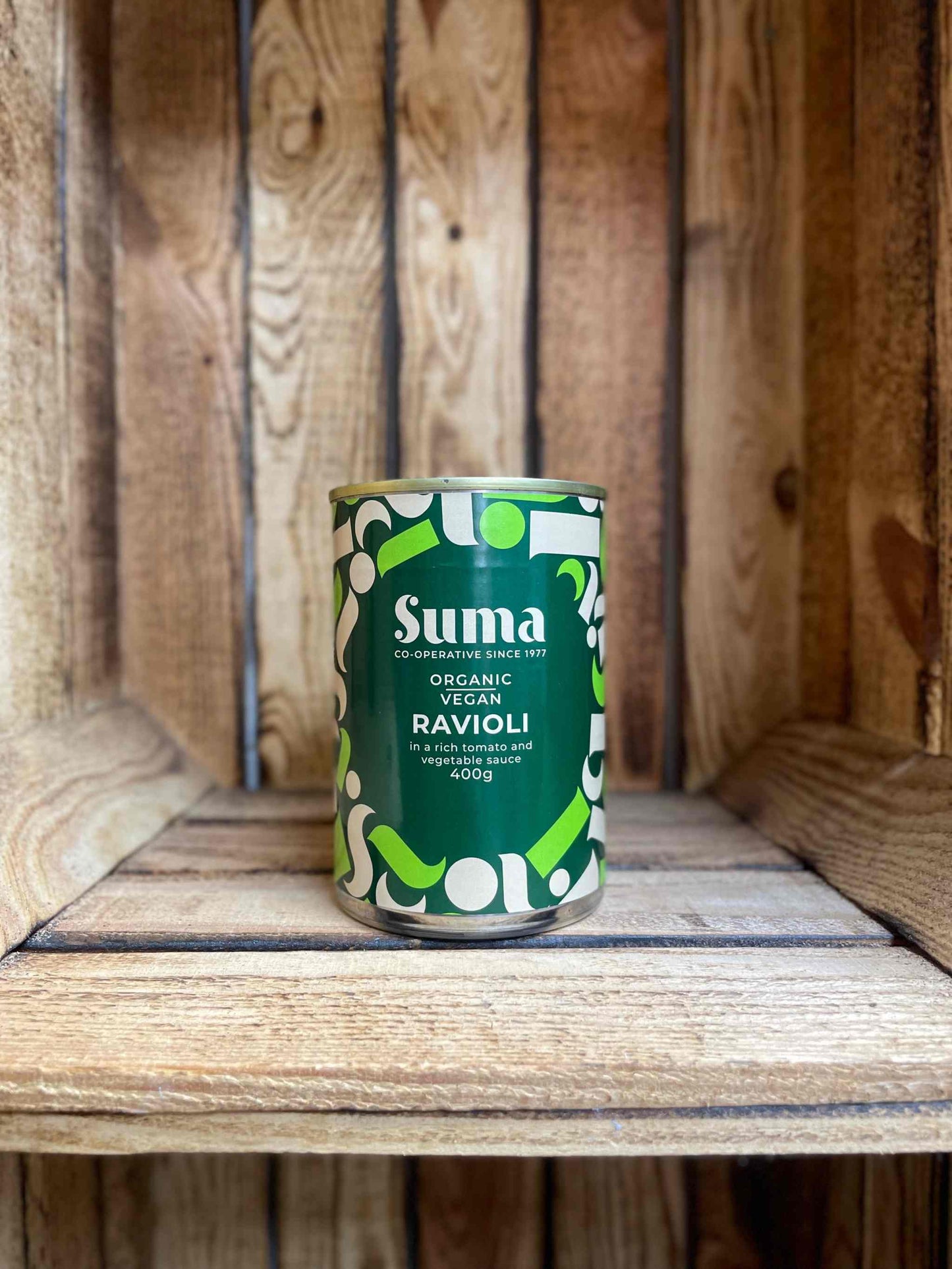SUMA Tins & Jars featuring vegan ravioli on a wooden shelf.