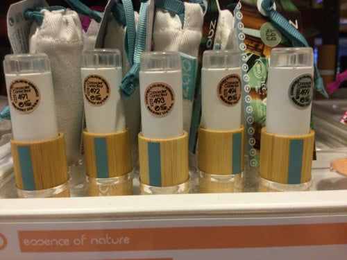 Zao concealer stick display in eco-friendly bamboo packaging.