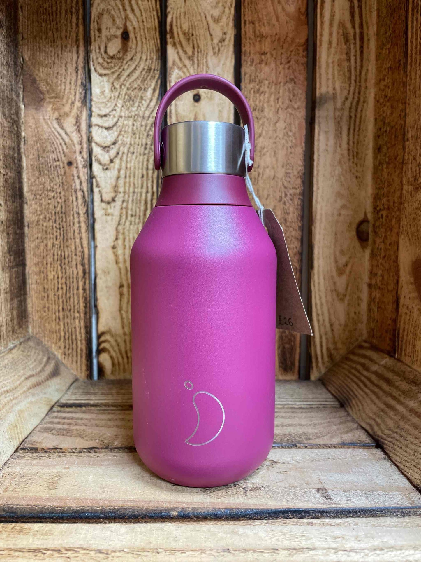 Eco-friendly Chillys 350ml Bottle with advanced insulation, purple design, wood background.