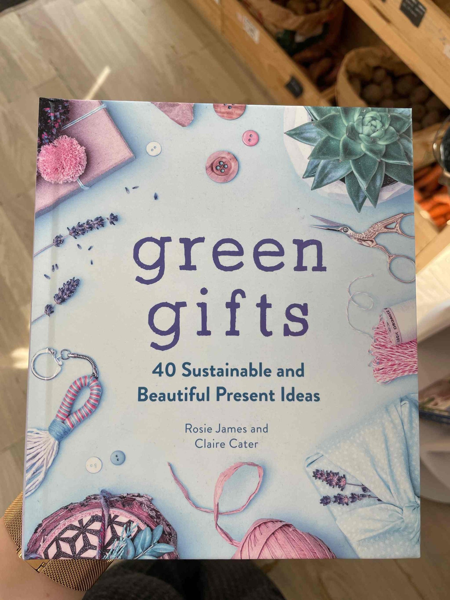 Eco-friendly book cover for "Green Gifts: 40 Sustainable and Beautiful Present Ideas," showcasing various sustainable gift items.
