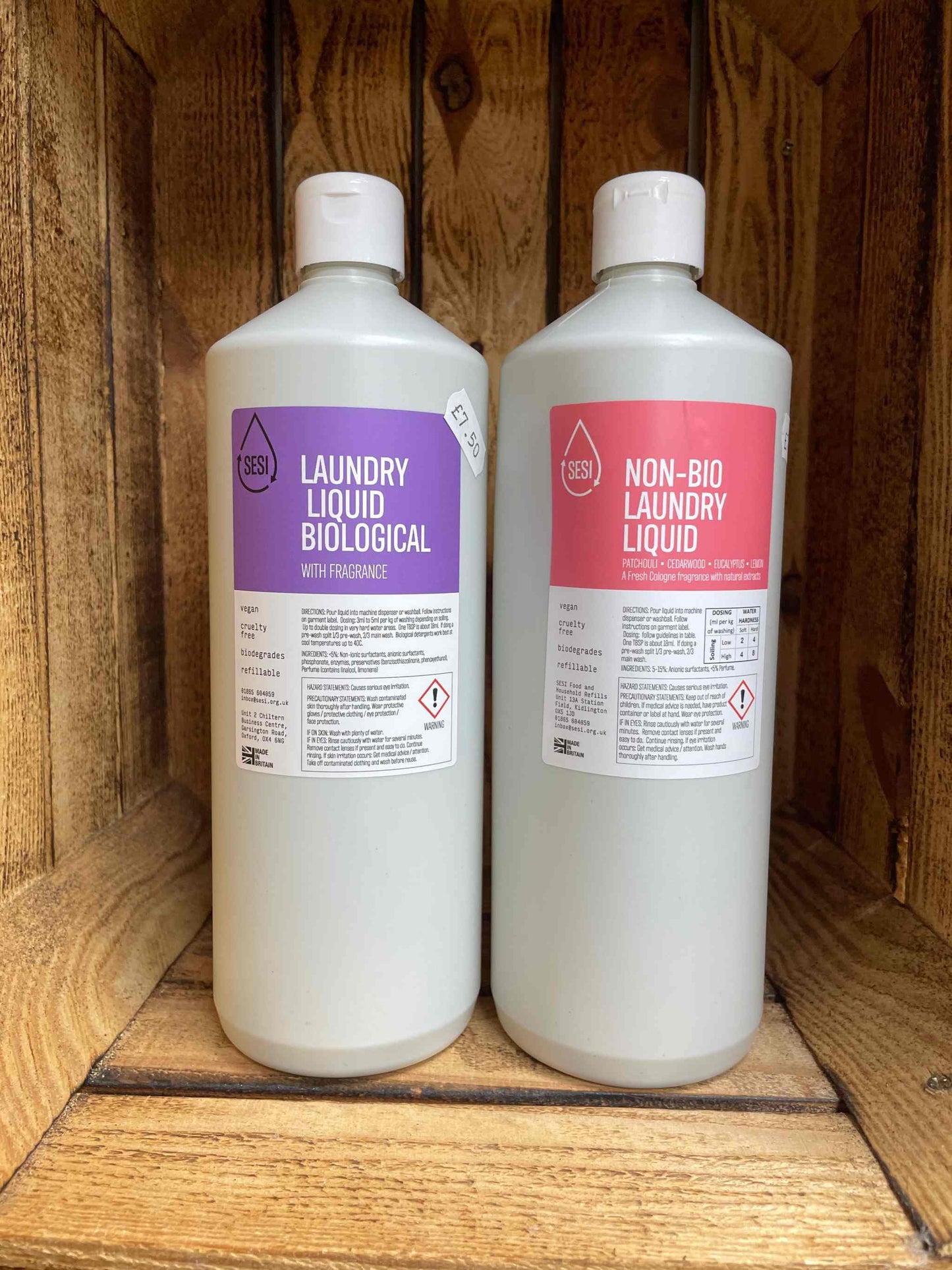 1L Pre Filled Laundry Liquid bottles (Bio & Non-Bio) on wooden shelf.