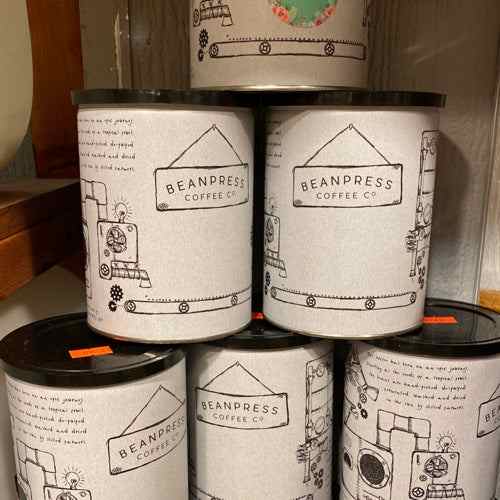 Bean Press coffee tins with airtight seal for freshness, stylish design, and eco-friendly materials.