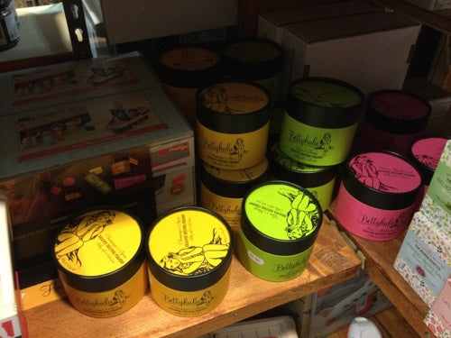 Bettyhula delicate dusting powder, talc-free formula in vibrant packaging on display.