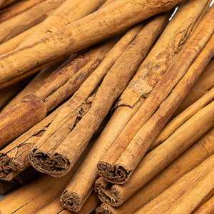 Cinnamon quills (25g) providing aromatic and flavorful culinary enhancement.