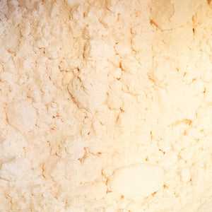 Custard mix powder close-up, creamy texture, 100g package.