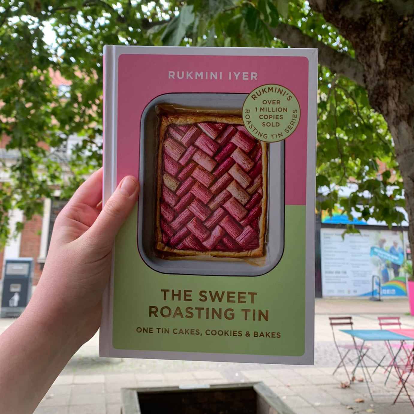 The Sweet Roasting Tin cookbook by Rukmini Iyer featuring easy gourmet recipes.