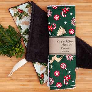Festive washcloth with vibrant holiday-themed design and ultra-soft texture on a wooden background.
