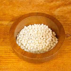 Toasted Sardinian Fregola, organic, 100g in wooden bowl.