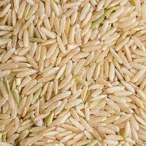 Long grain brown rice (100g) close-up showing nutty texture and color.