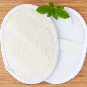 Loofah pad by Croll & Denecke on a wooden surface.