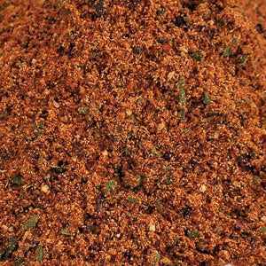 Piri piri seasoning close-up (25g) showing vibrant blend of spices.