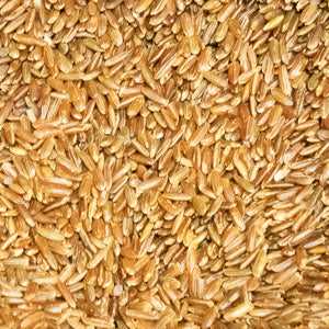 Red rice organic grains close-up, 100g package.