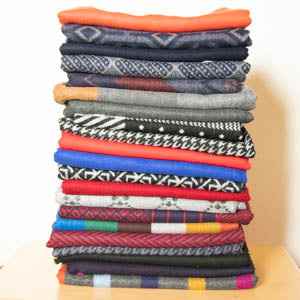 Eco-friendly orange bamboo scarf by Swole Panda; luxurious, versatile, and durable.