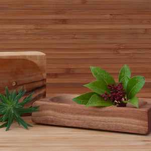 Handcrafted olive wood soap dish with rectangular design, showcasing rich grain patterns and rustic elegance; eco-friendly and durable for any bathroom decor.