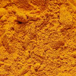 Turmeric powder (25g) with vibrant orange color, known for its anti-inflammatory and antioxidant properties.