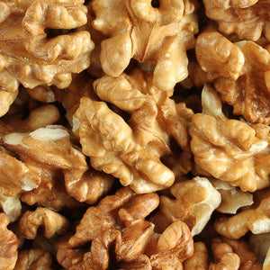 Walnut halves (100g) - nutrient-rich nuts packed with omega-3, antioxidants, and fiber, perfect for heart health and versatile cooking.