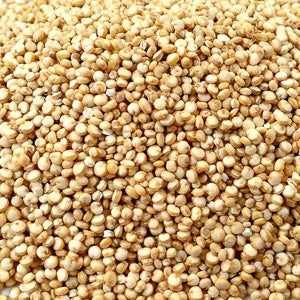 Organic white quinoa grains, 100g package, nutrient-rich superfood.