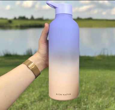 Neon Kactus Water Bottle 1.3L Tritan with vibrant design and Twist & Shout cap, eco-friendly and durable.