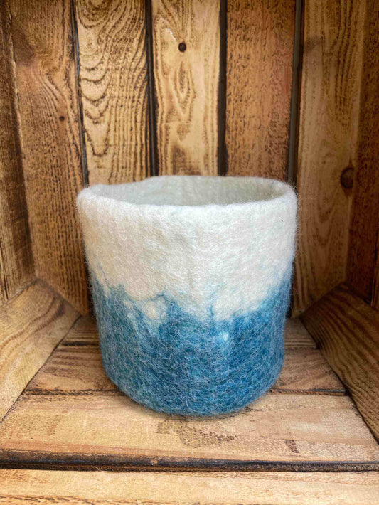 Turquoise felt handmade jute medium, eco-friendly decor accent.