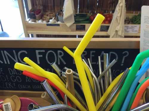 Eco-friendly, reusable single silicone straw display.