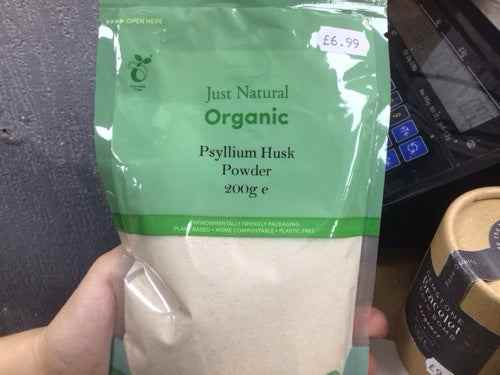 Organic psyllium husk powder in a green package, 200g, promoting digestive health and weight management.