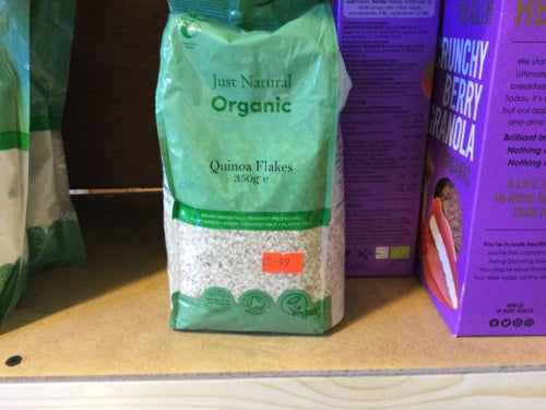 Org Quinoa flakes 350g package on shelf