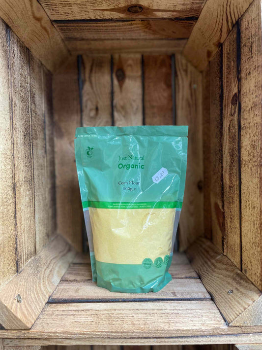 Organic Corn Flour 500g package in wooden crate.