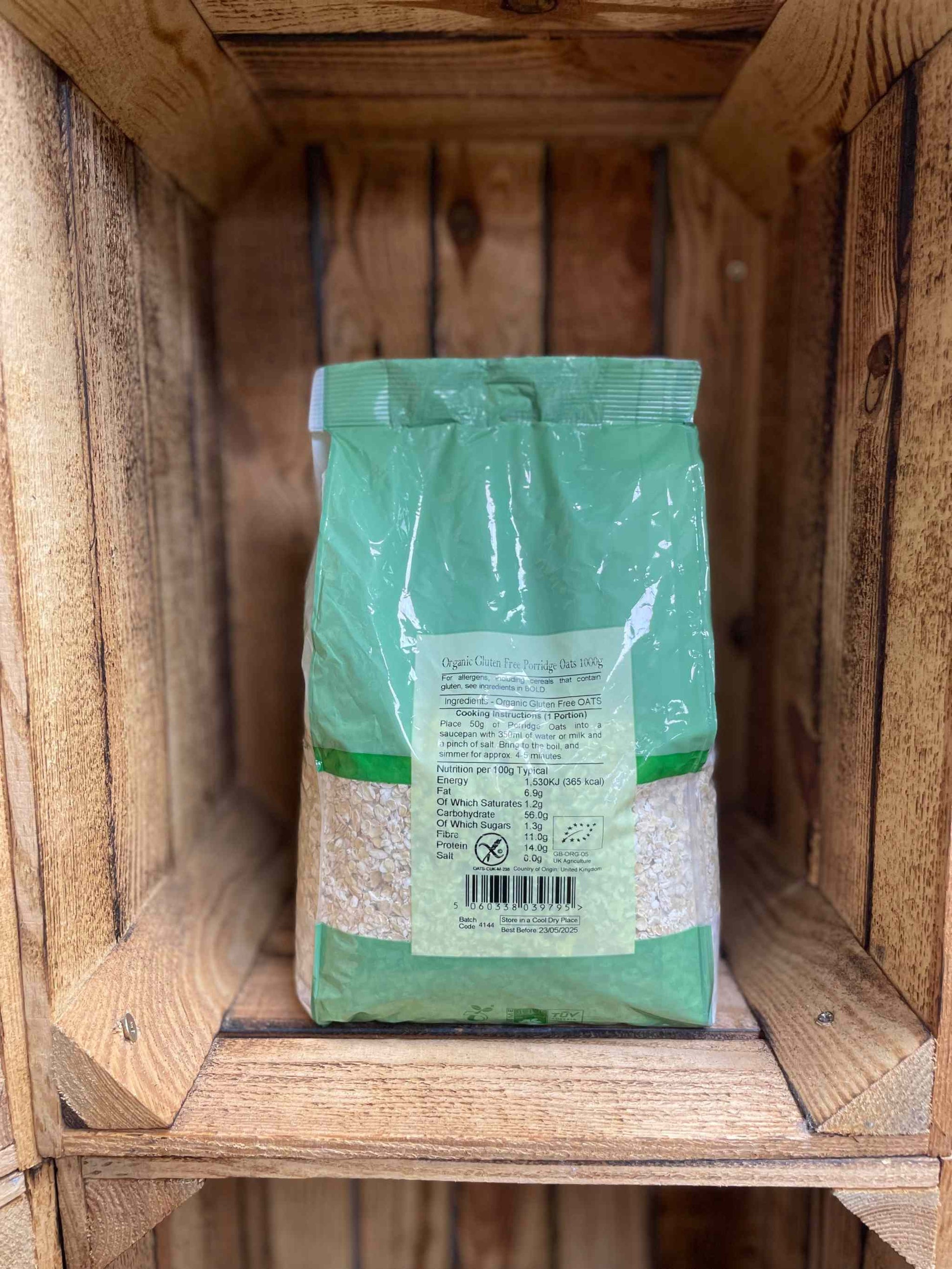 Organic Gluten Free Porridge Oats, 500g package on wooden shelf