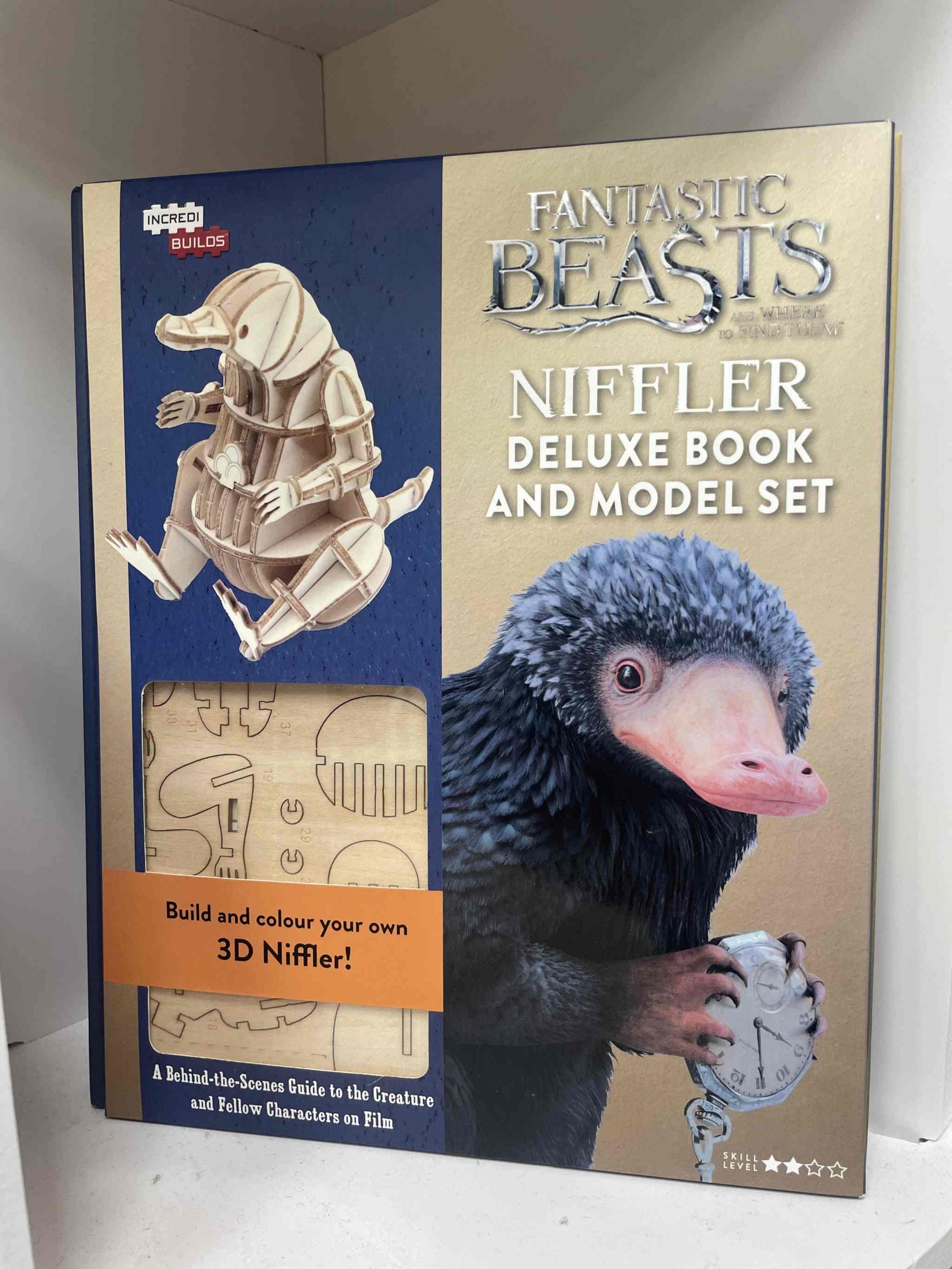 Fantastic Beasts Niffler deluxe book and model set.