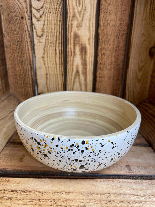 Eco-friendly small bamboo snack bowl with speckled design.