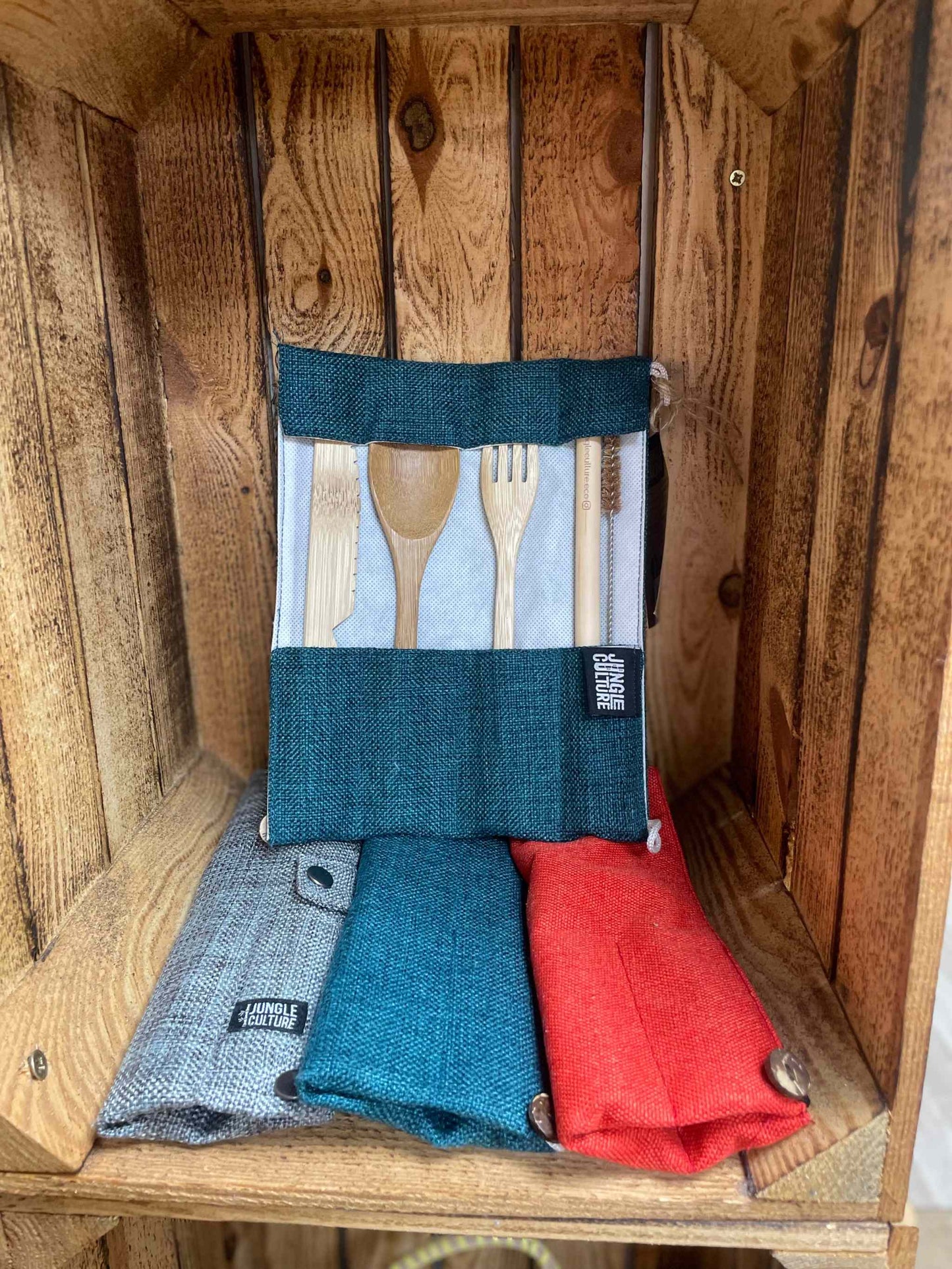 Eco-friendly cutlery set in wrap, Jungle Culture design, beige and multicolor, sustainable dining accessory.