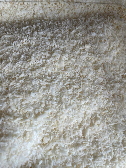 Premium desiccated coconut flakes, rich in tropical flavor and aroma, perfect for cooking and baking.