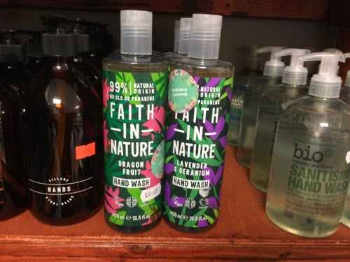 Faith hand wash pre filled dragon fruit and lavender geranium bottles on display shelf.